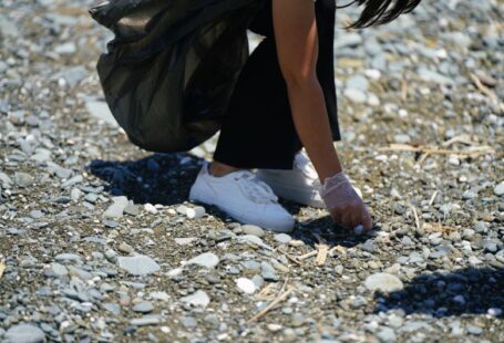 Volunteering Impact - a person's legs and feet in the sand