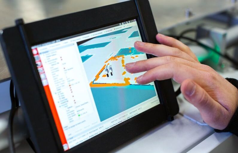 Virtual Reality Education - person holding black tablet computer