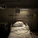 Mental Health Campus - a hospital room with a bed and a monitor