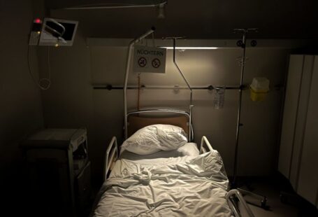 Mental Health Campus - a hospital room with a bed and a monitor