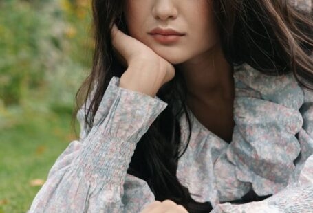 Outdoor Education - Beautiful Woman Reading Book on the Green Grass