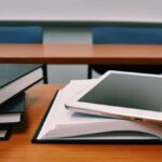 Virtual Classroom - Silver Ipad on White Book Page