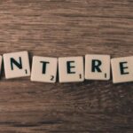 Social Media Education - Pinterest Scarbble on Brown Wood