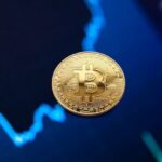 Virtual Exchange - Gold bitcoin coin on background of growth chart