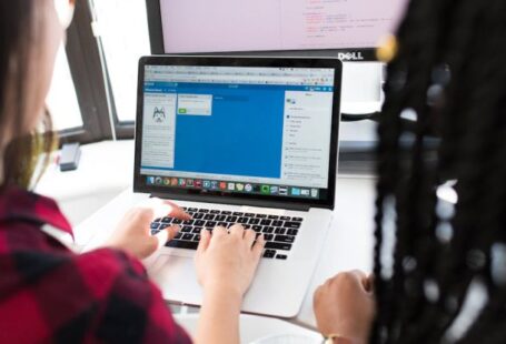 Education Technology - Woman Using Macbook Pro