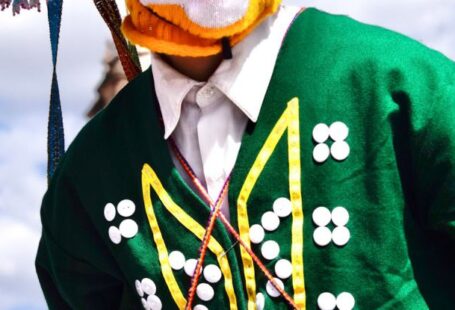 Cross-cultural - A man in a costume with a mask on his face