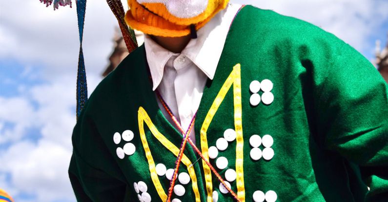 Cross-cultural - A man in a costume with a mask on his face