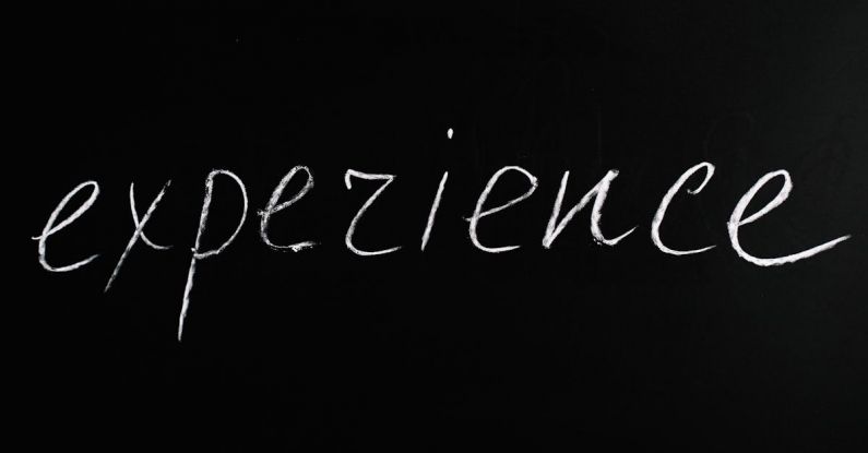 Competency-based Education - Experience Lettering Text on Black Background