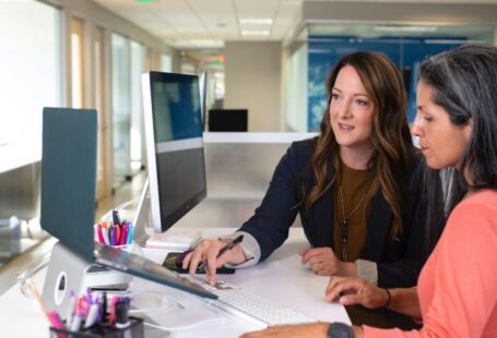Women STEM - woman in black blazer sitting at the table